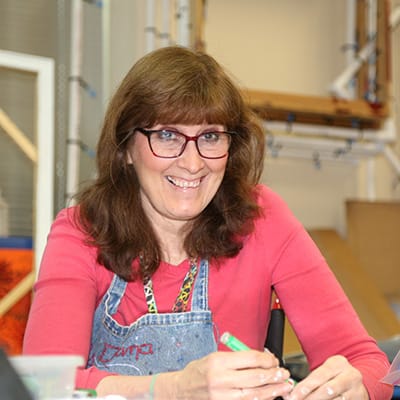 Woman taking an art class.