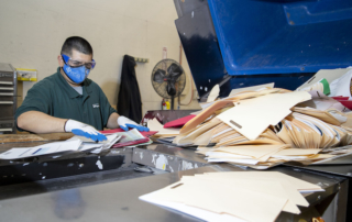 Man working at a commercial shredding facility in Las Vegas.