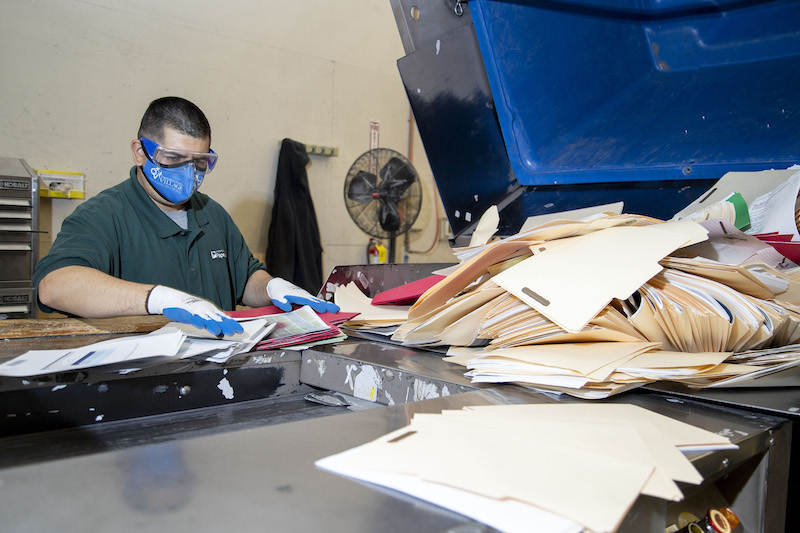 Man working at a commercial shredding facility in Las Vegas.