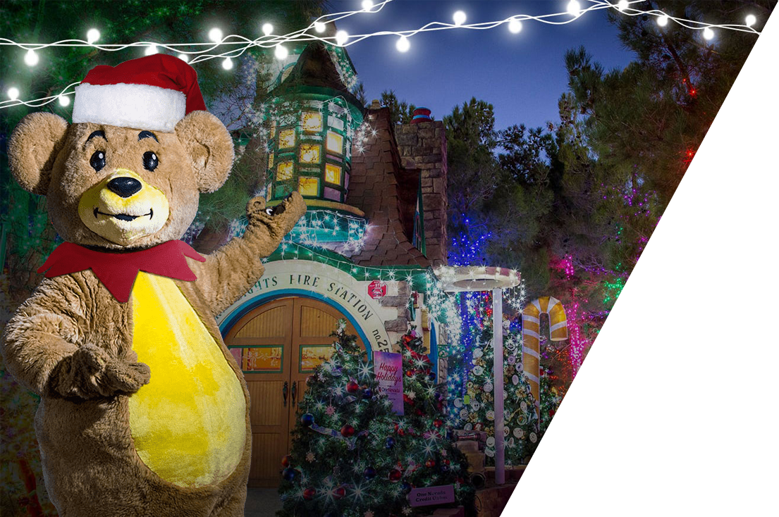 magical-forest-angle Large bear costume with Santa hat standing in front of Magical Forest in Las Vegas.