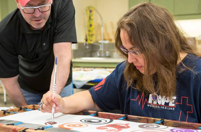 hobbies-for-adults-with-developmental-disabilities-feature – 1 Woman painting while man observes.