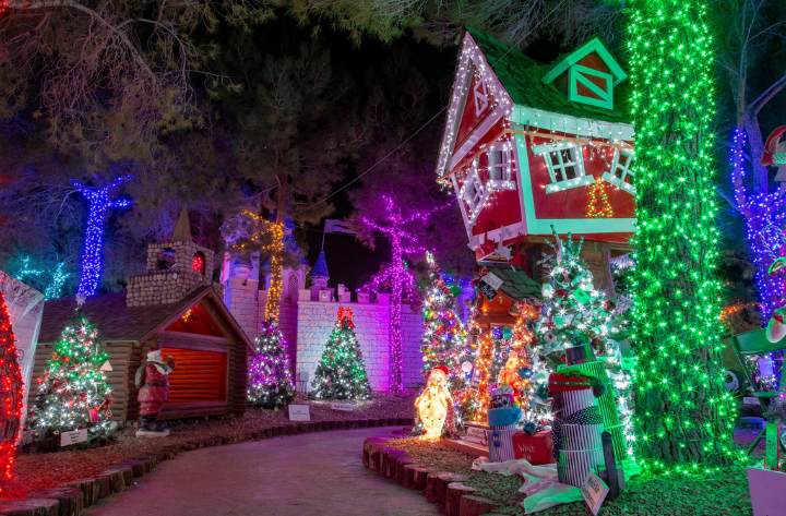 Holiday decorations lit at night.