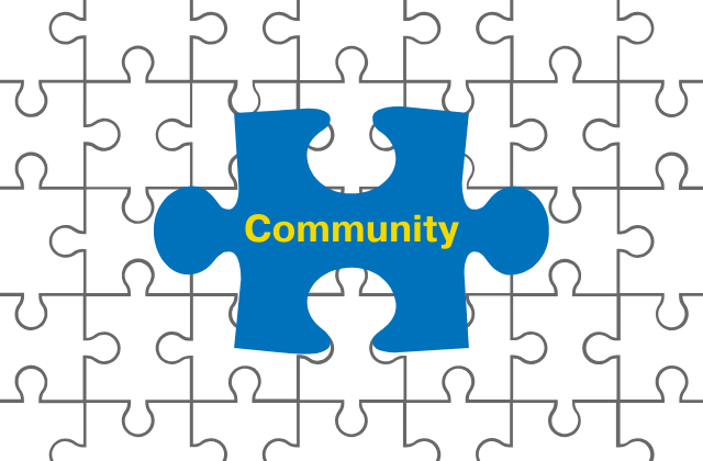 blue puzzle piece with the text 'community' in the center