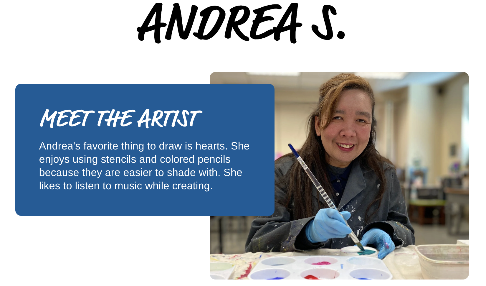 A smiling woman wearing a paint-splattered smock and blue gloves uses a paintbrush and palette in an art studio.