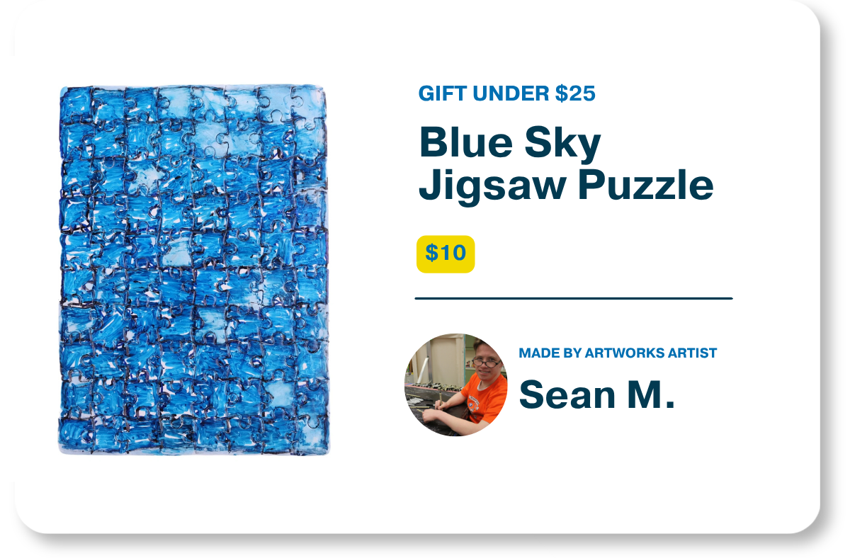 Product graphic for Gifts Under $25 showcasing the $10 "Blue Sky Jigsaw Puzzle" featuring a textured blue abstract pattern alongside product details and a profile photo of artist Sean M.